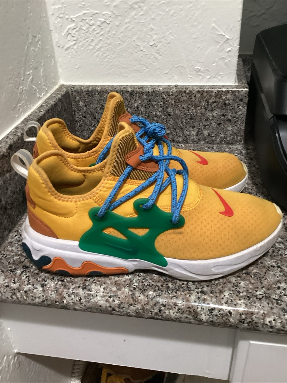 Nike Yellow Athletic Sneakers with Blue Laces and Green Cage